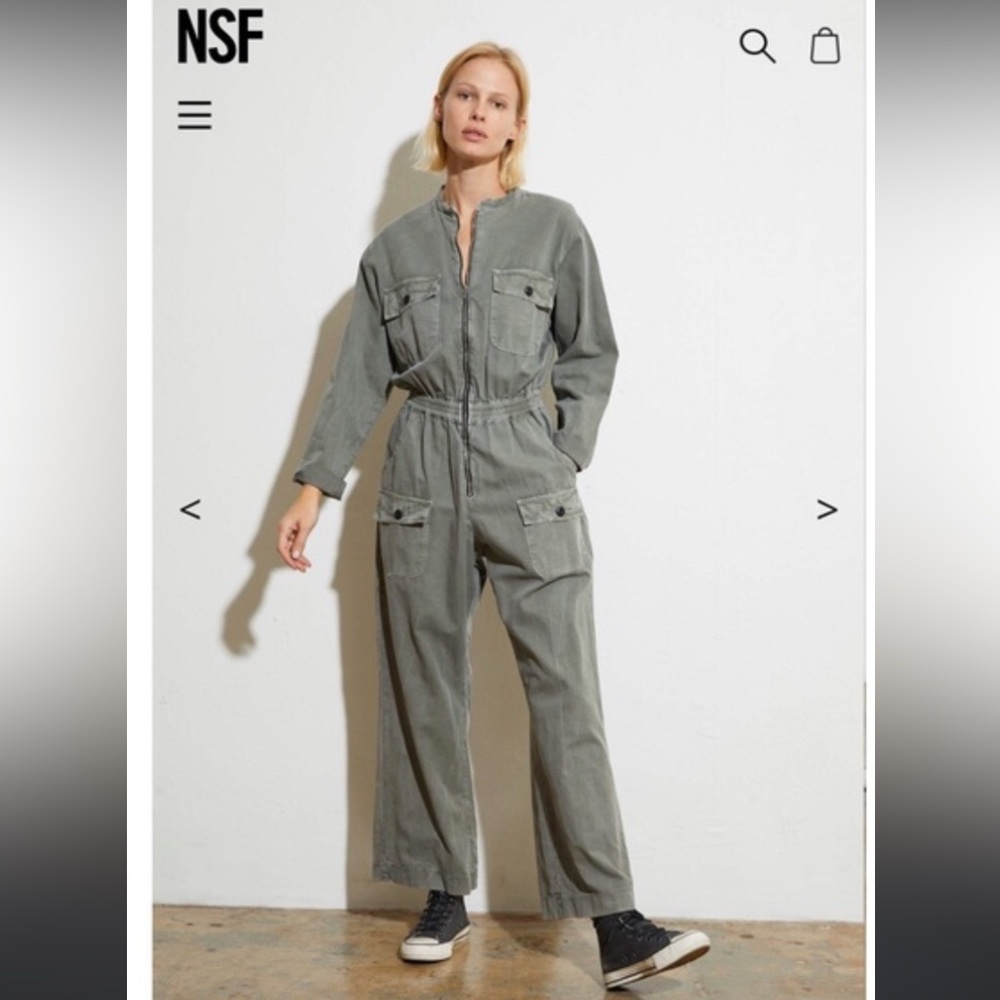 Super cute, perfectly fitted, zipper jumpsuit from NSF. Gently used condition.